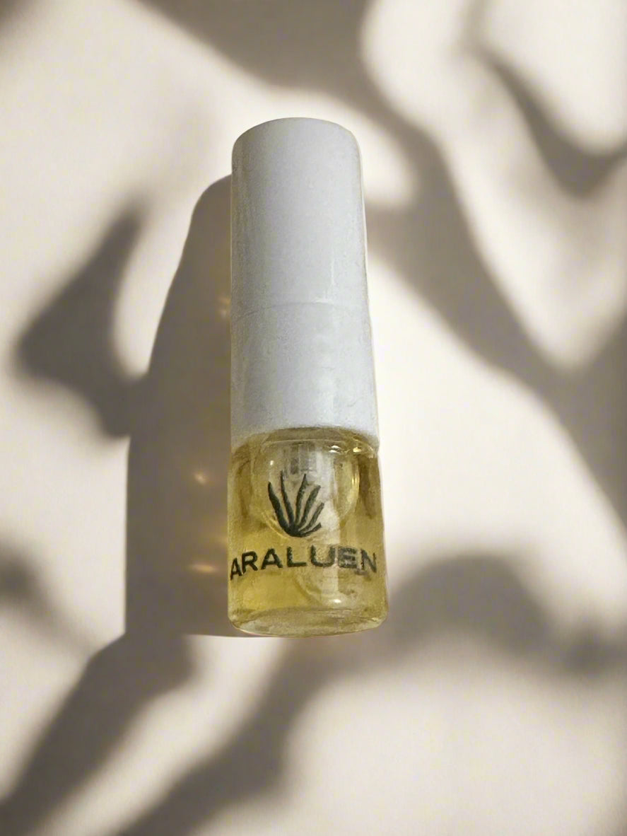 Bottle of Araluen oil on a light background