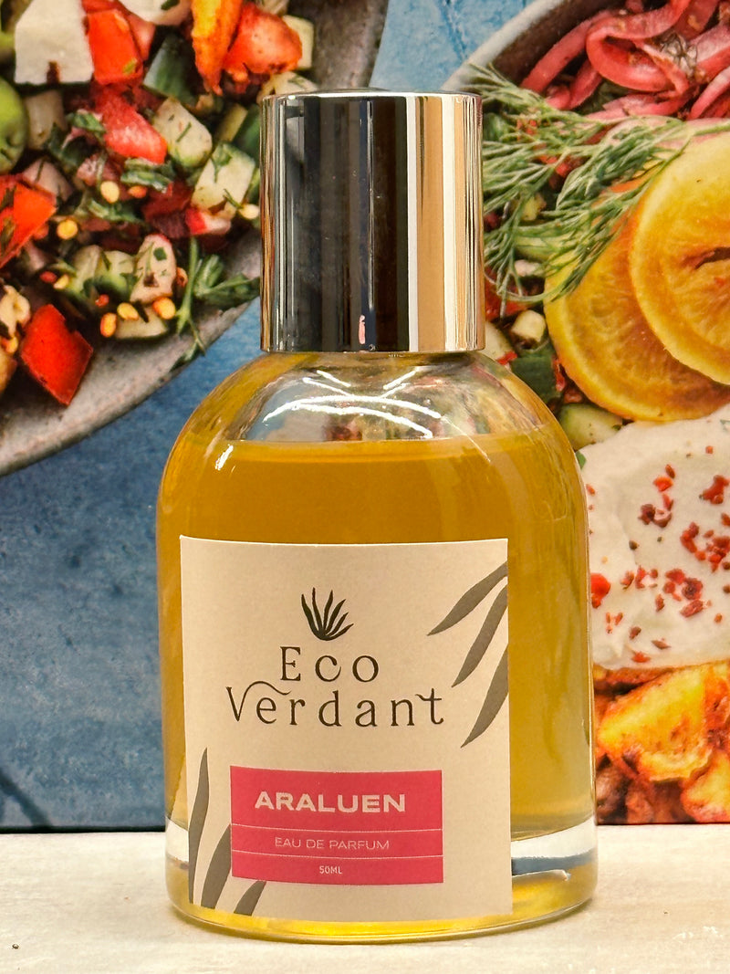 Eco Verdant Perfume bottle against colourful food background