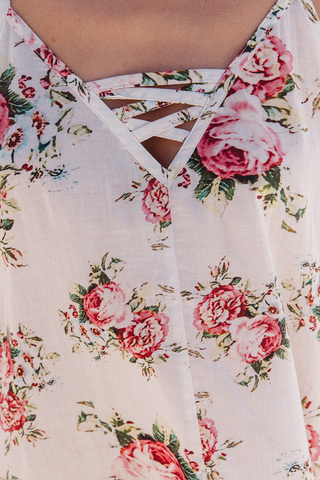 Floral dress with pink roses on a white background