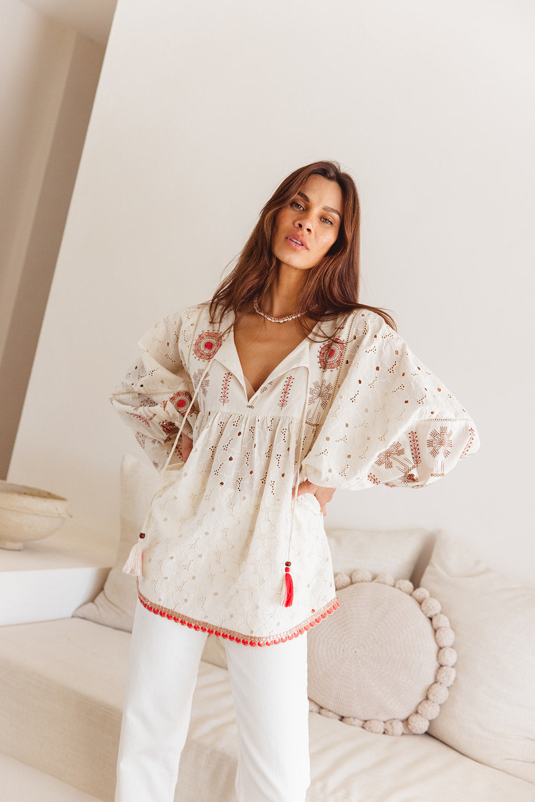 Woman in embroidered long blouse 